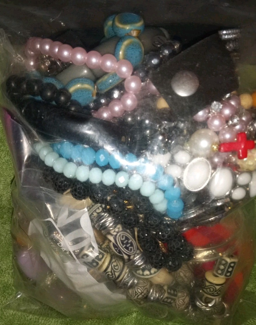 MULTIPLE FASHION BRACELETS MOST STRETCHY BUT SOME PRETTY ONES, SOME SIGNED BRASS
