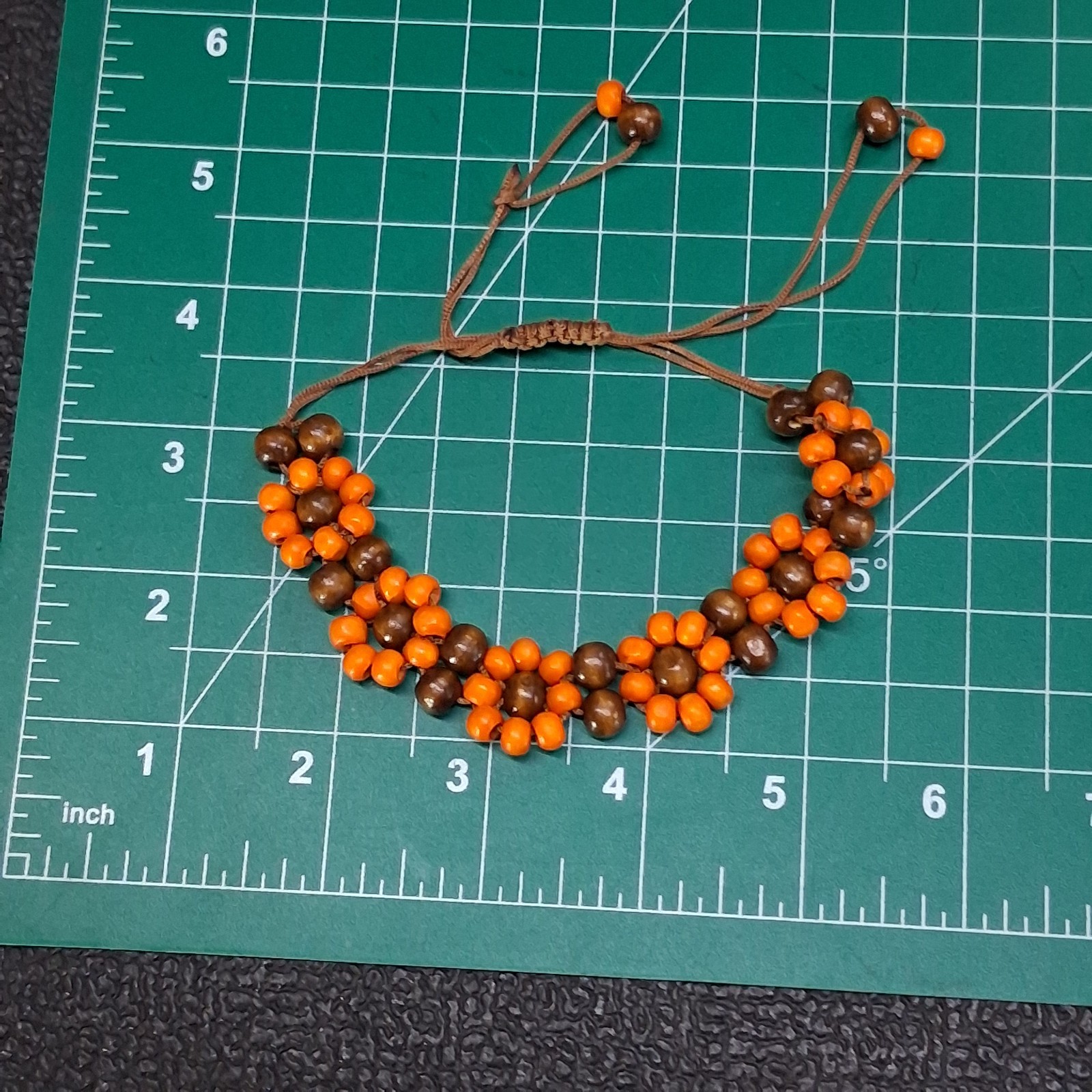 Orange & Natural Wood Channel Set Bead Adjustable Size Brown Cord Bracelet