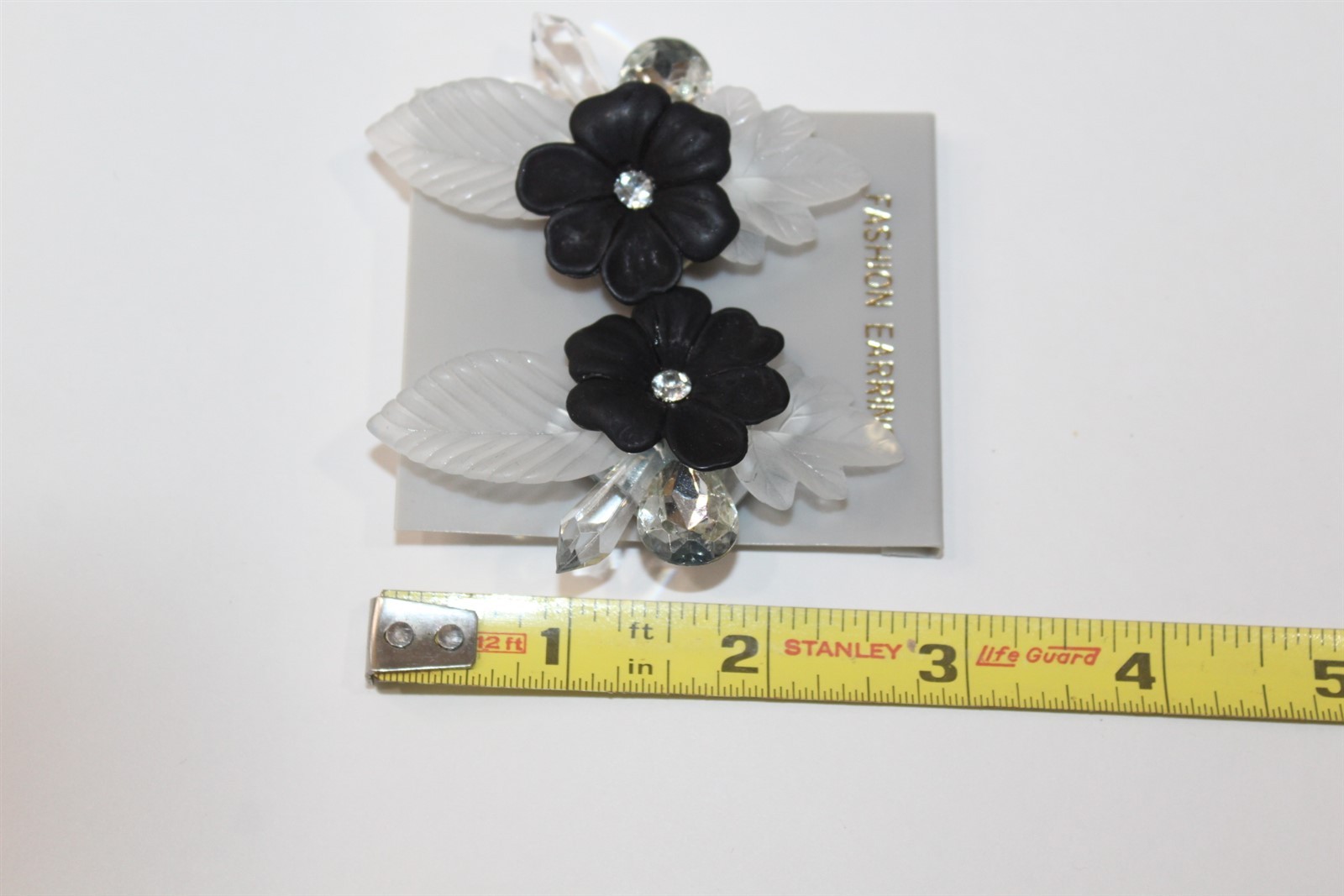 Clip On Earrings Acrylic with Black Floral Design 2 1/2″ Vintage