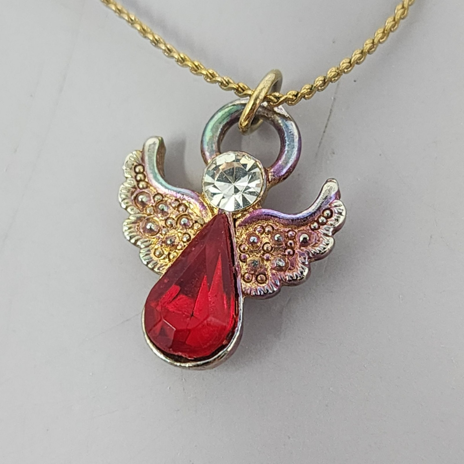Gold Angel Pendant Necklace With Red Gemstone & Crystal Accents