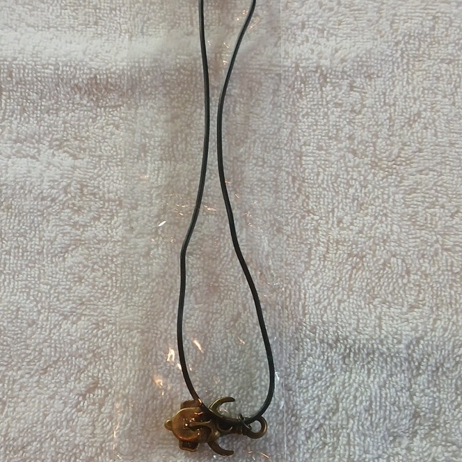 Gold-Tone Face Charm Pendant Necklace on Black Cord, No Stones