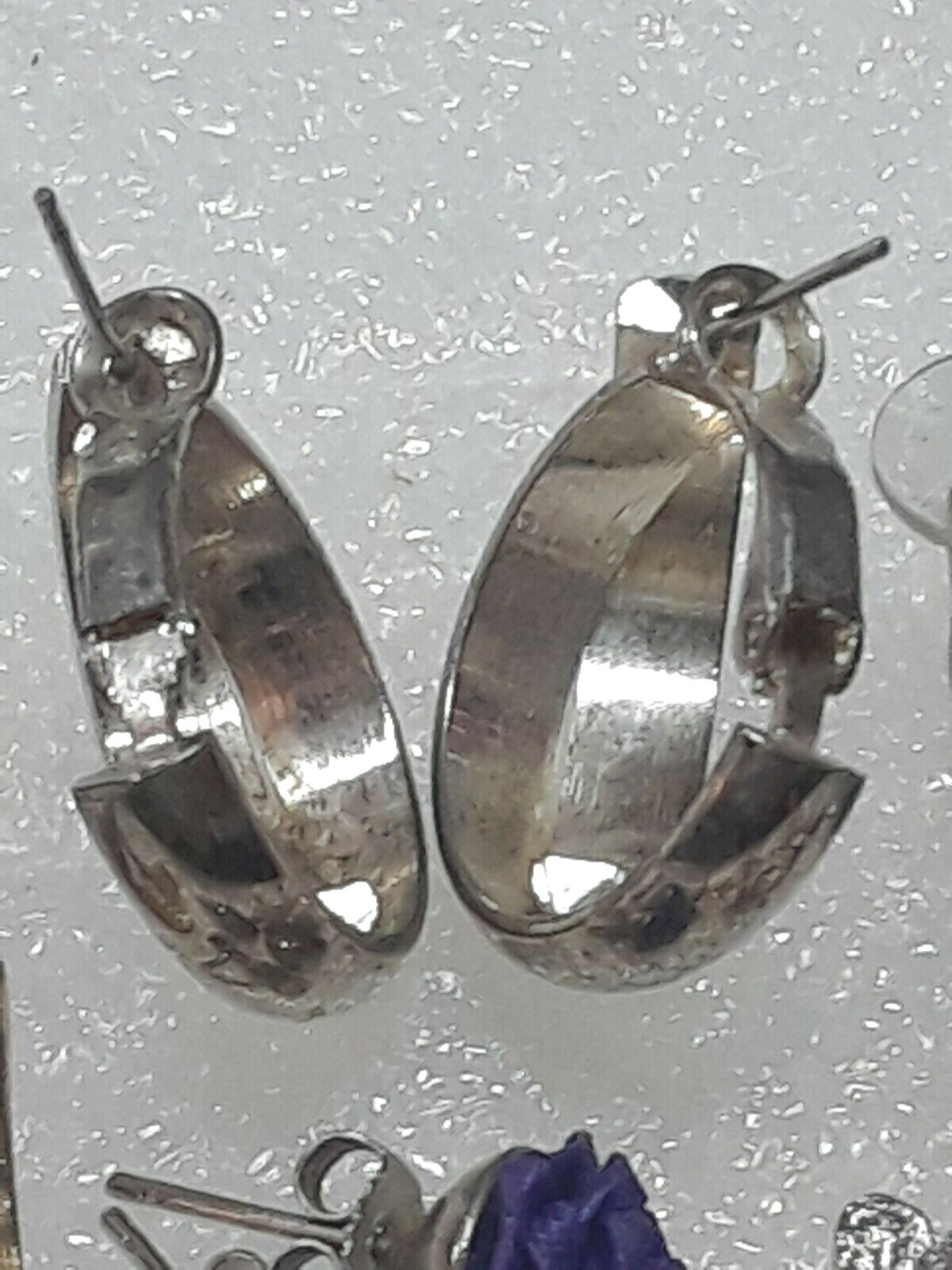 Pierced earrings with stones. pink, purple, clear. gold tone silver tone. 8 pair