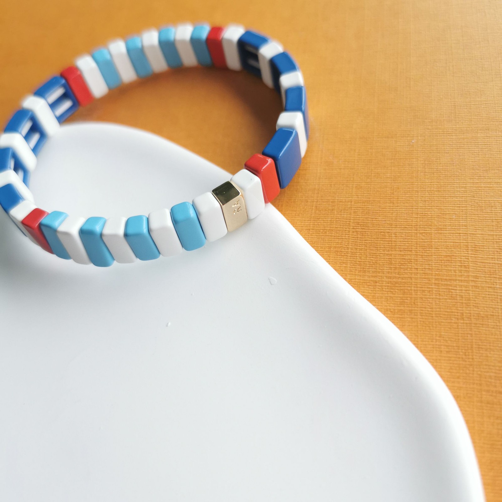 Roxanne Assoulin Rainbow Brite Gold Blue White Red Stretch Bracelet