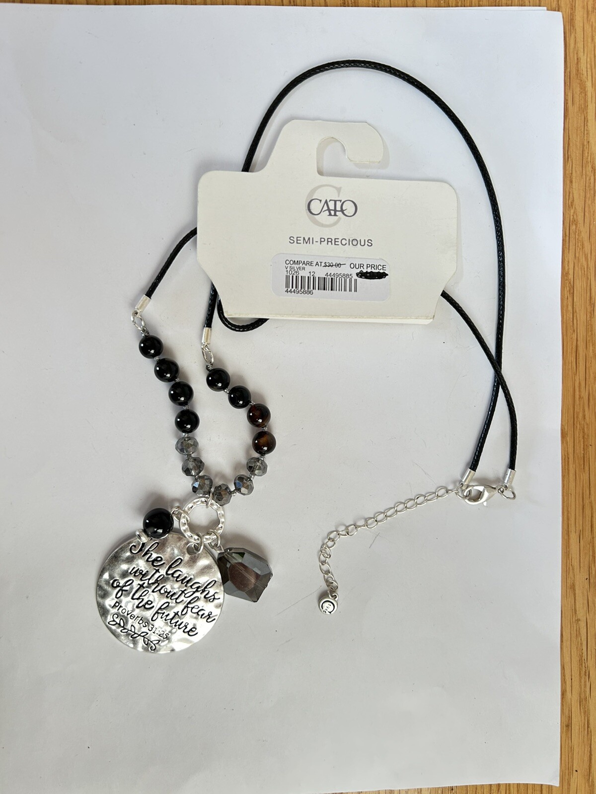 1946 “She Laughs Without Fear of the Future” silver tone long Pendant necklace