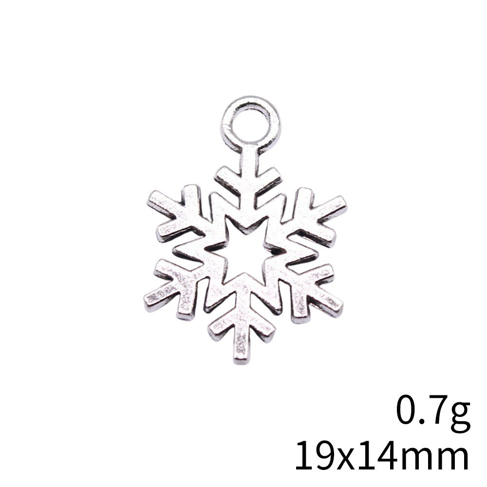 60PCS Silver Tone Metal Filigree Snowflake Charm Pendant Winter Holiday XCS72