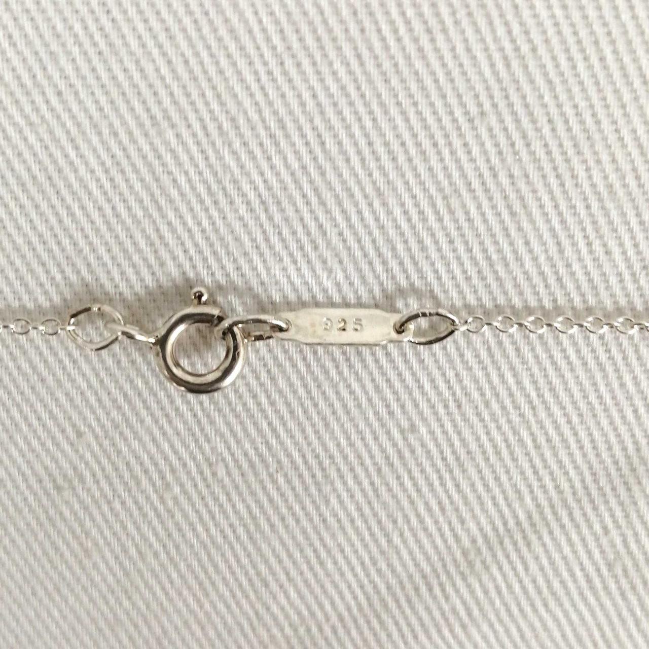 TIFFANY CO. Signature Cross Necklace Model Number 925