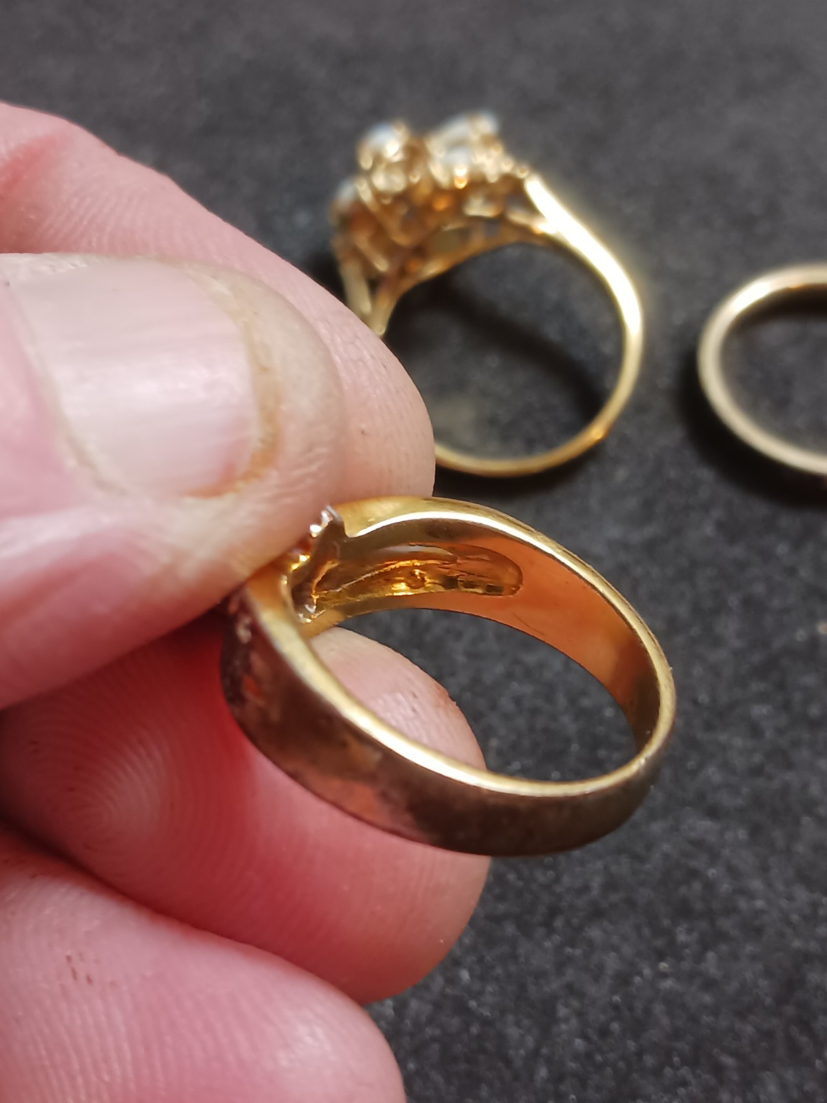 4 Beautiful Rings 3 with no markings 1 stamped M with a Trademark Nice