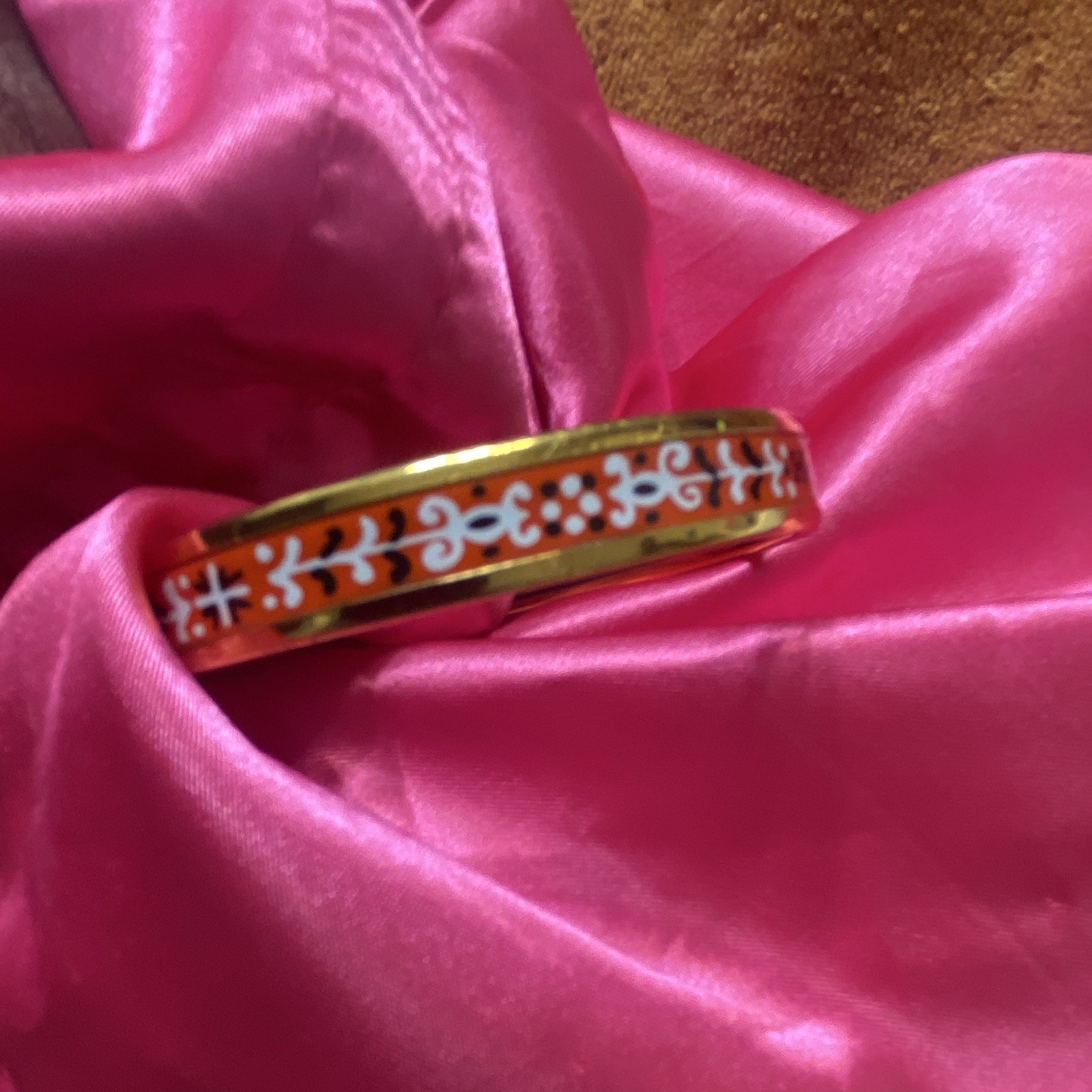 HERMÈS Signed Enamel Bangle Bracelet Gold Tone Orange White and Black.