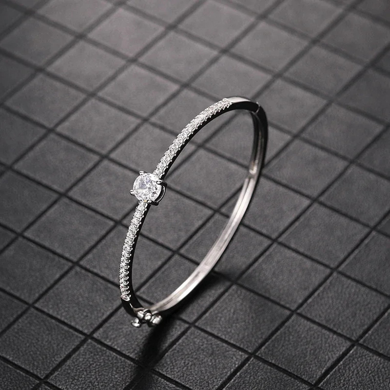 Fashionale Women’s Cubic Zirconia Bangle Silver Color/Gold Color.