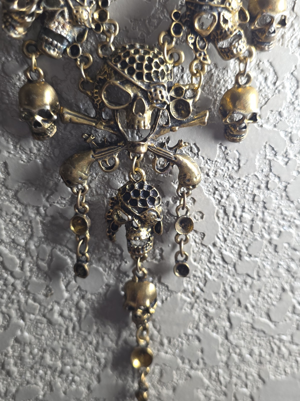Gold Tone Metal Skull Charm Pendant Statement Necklace, No Stone