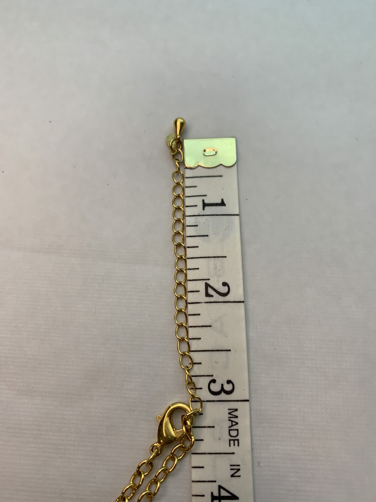 26 inch Necklace with purple heart pendant with extender signed is china