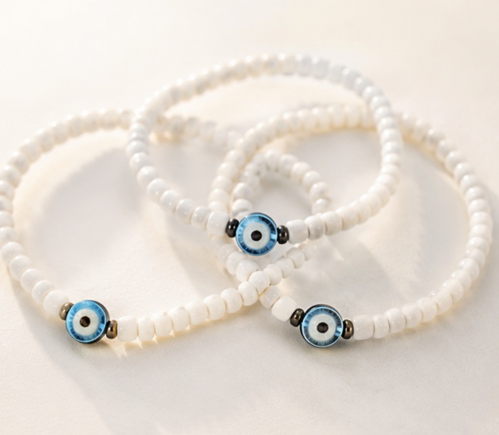 Gorgeous handmade white beaded evil eye anklet Stretchy and easy to wear