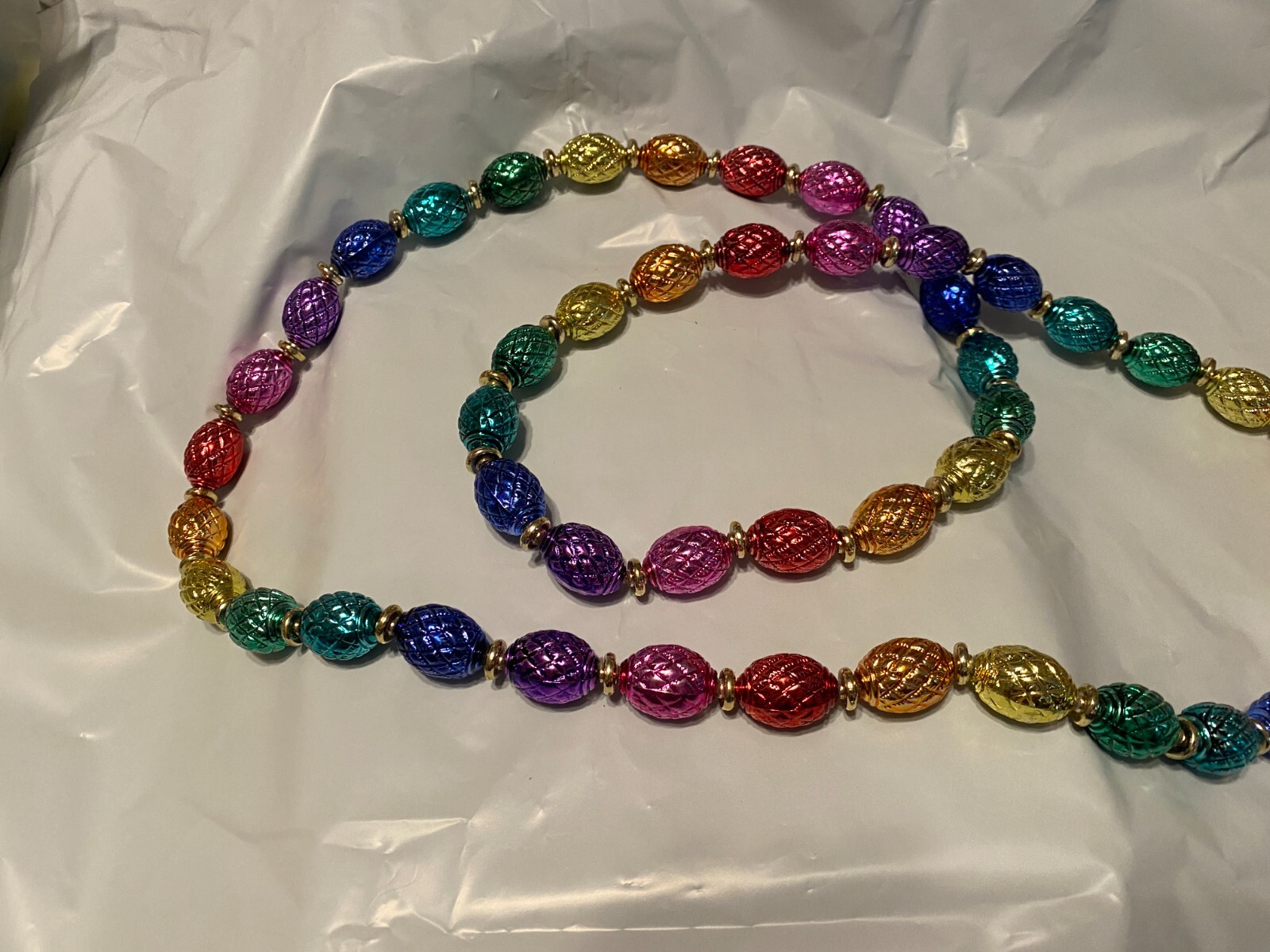 Beaded Necklace about 45 Inches long Pre owned in very good condition.