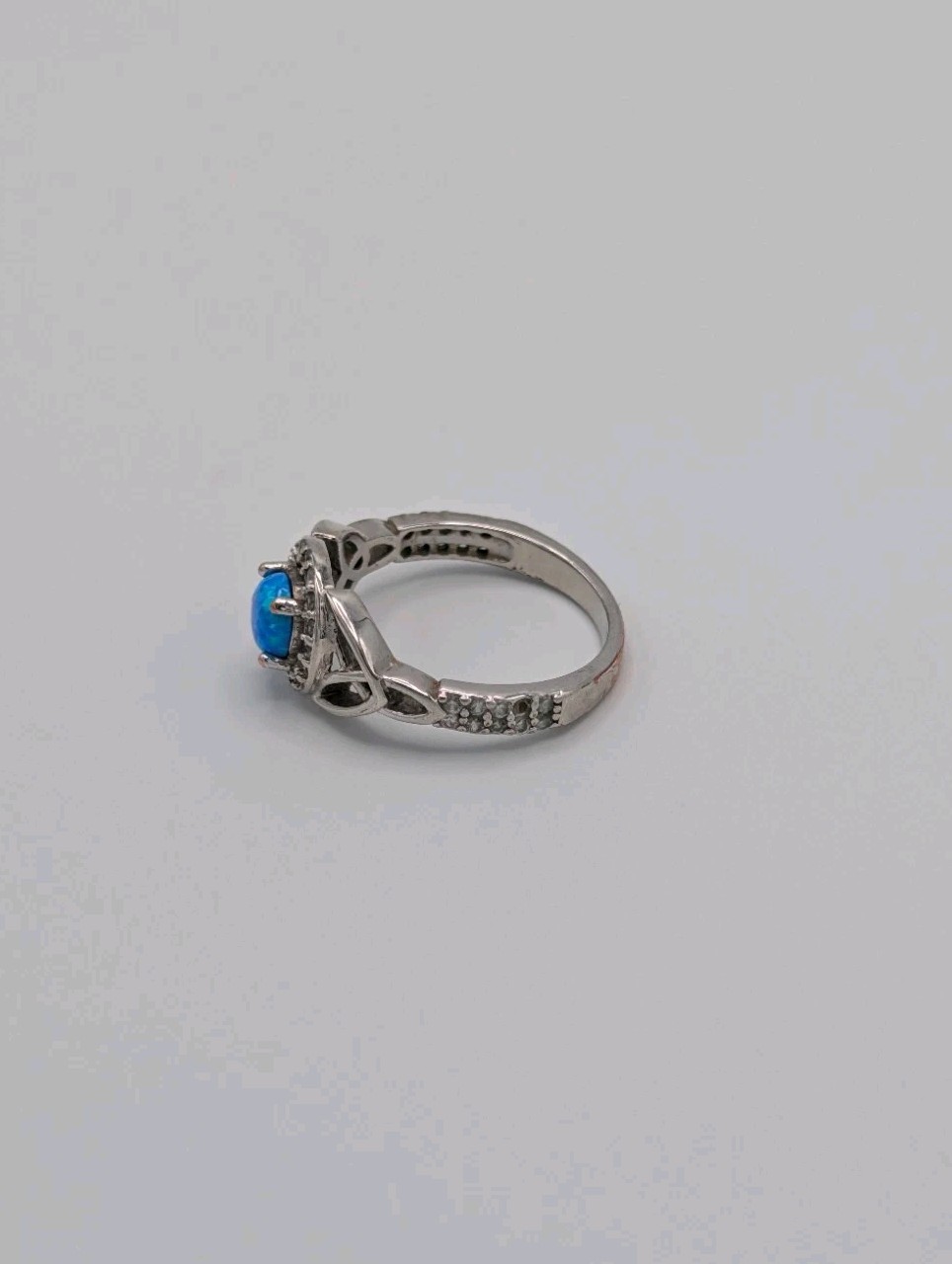 Synthetic Opal Cabochon CZ Halo Ring Trinity Celtic Band Silver Toned Plated