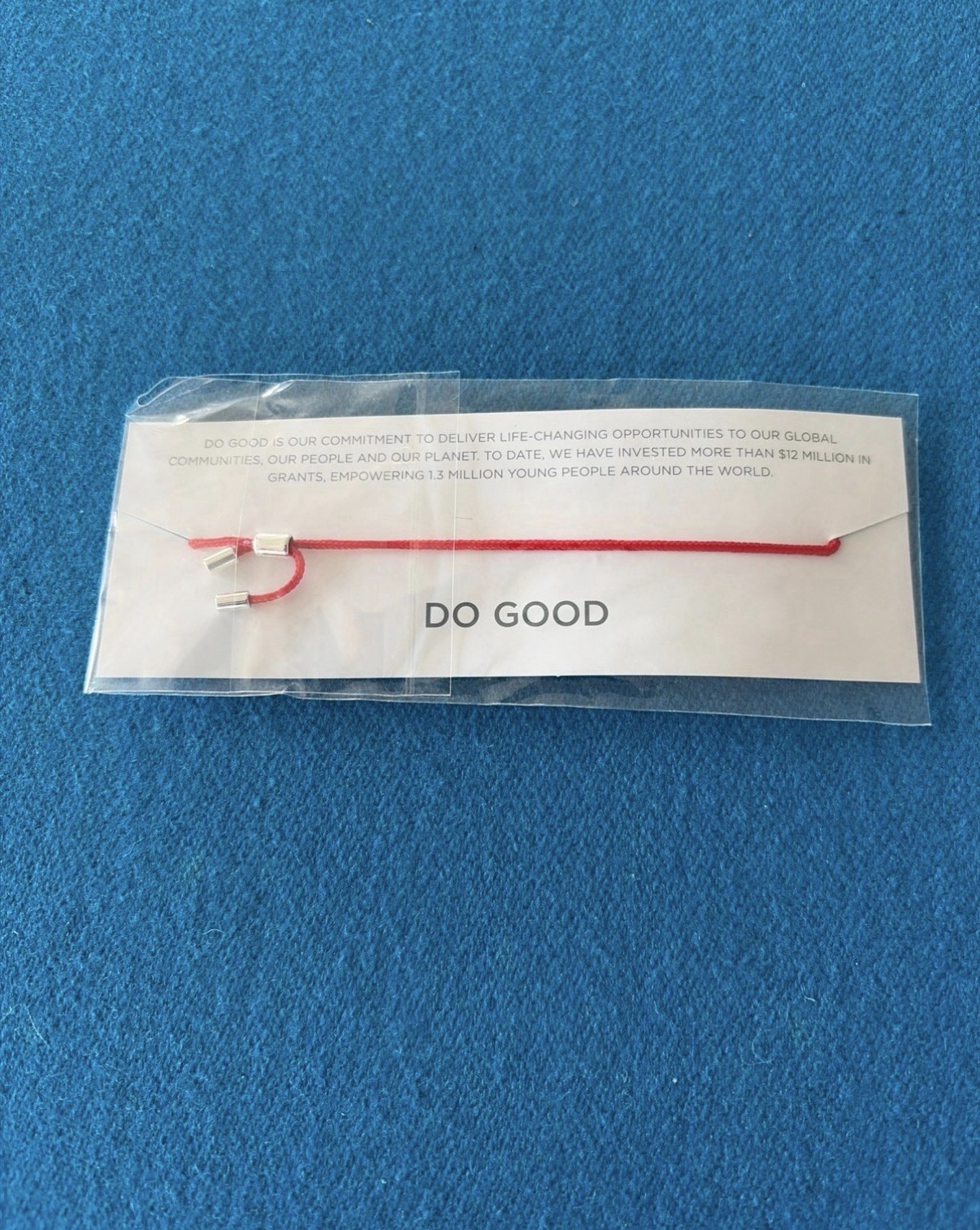 Rodan + Fields “DO GOOD” Silver Charm Red String Bracelet