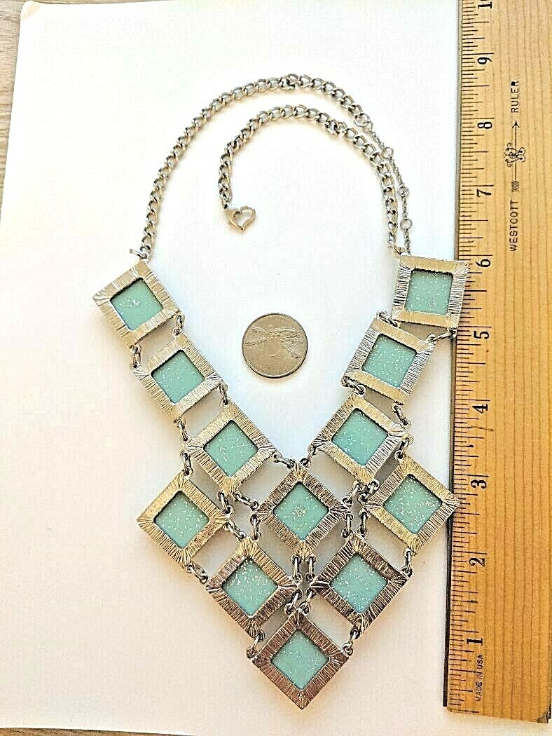 Multi Color Sparkle 12-Diamond Shapes in Graduated Bold Bib Necklace