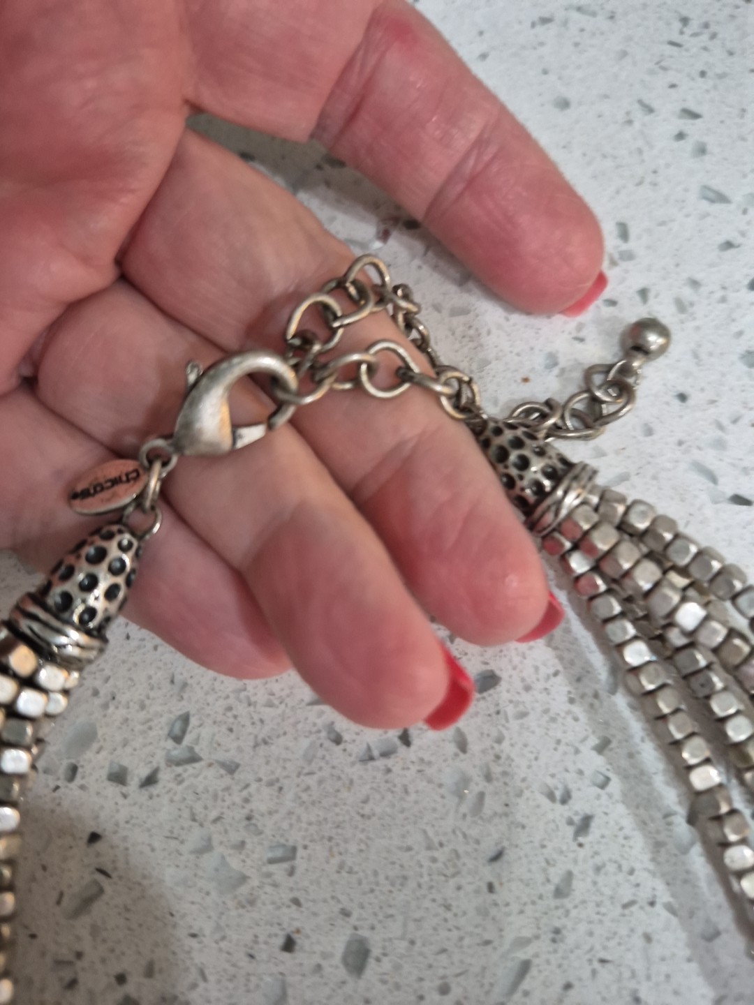 Beautiful strand of metal beads a timeless piece. dress it up or down heavy