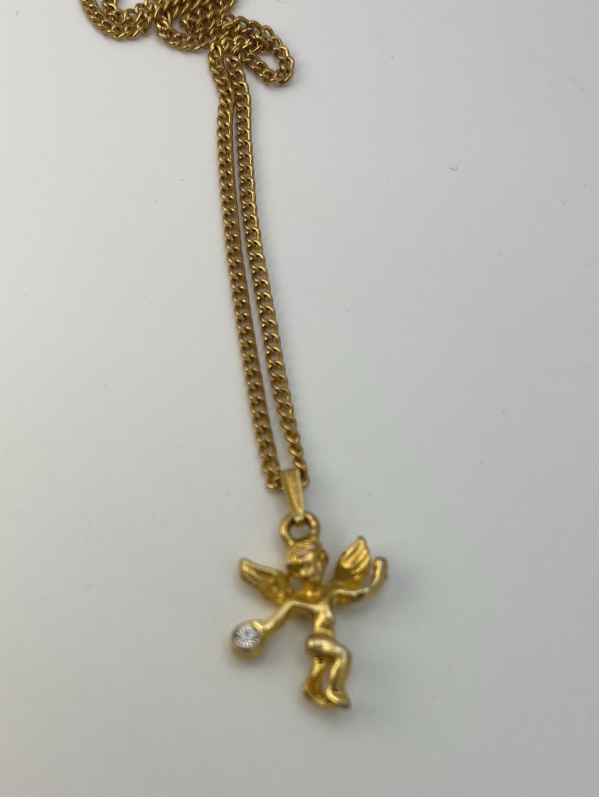 Gold Tone Crystal Cherub Pendant Necklace