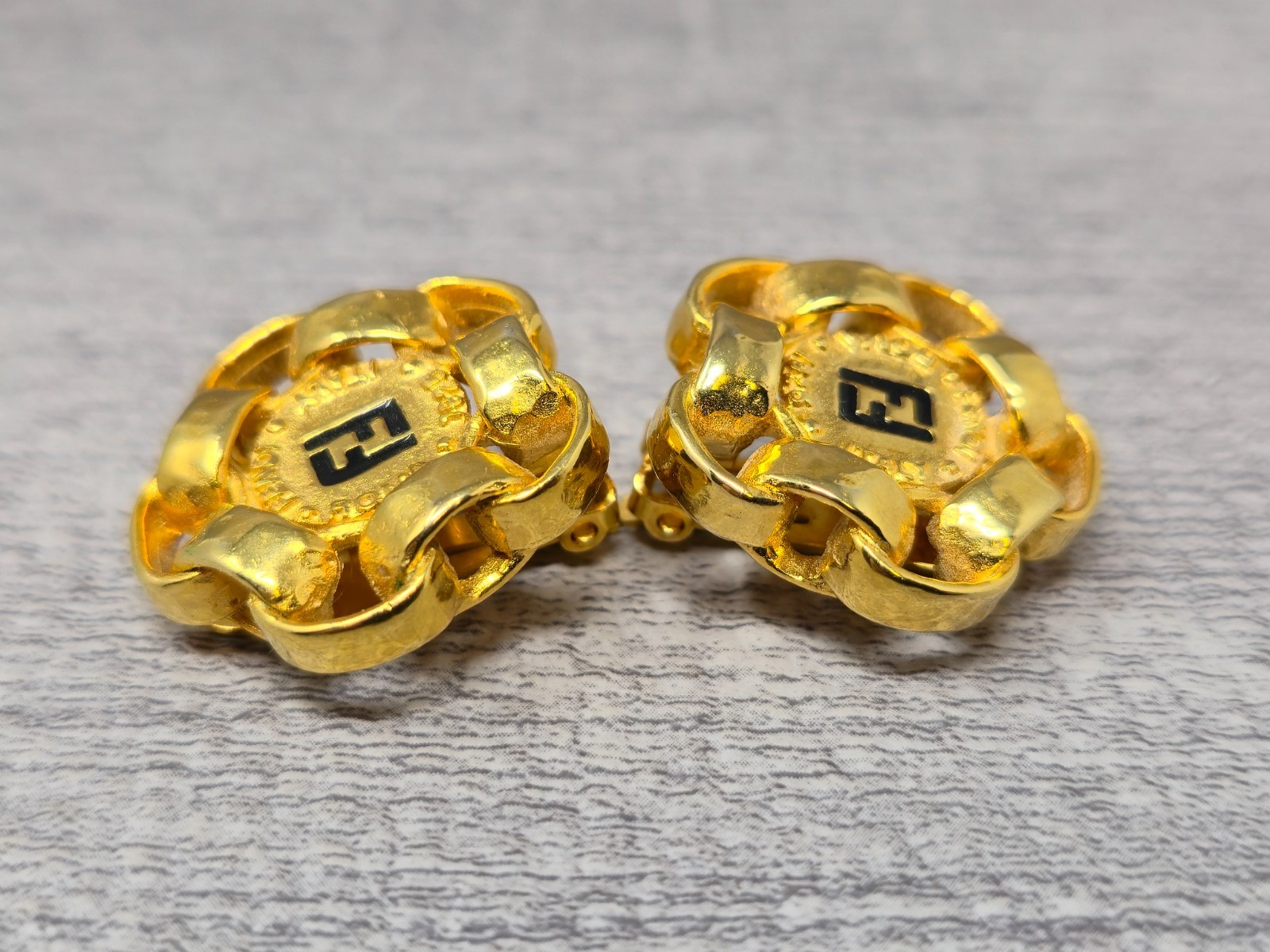 Vintage Fendi Coutre Clip On Earrings Gold Tone Spell Out