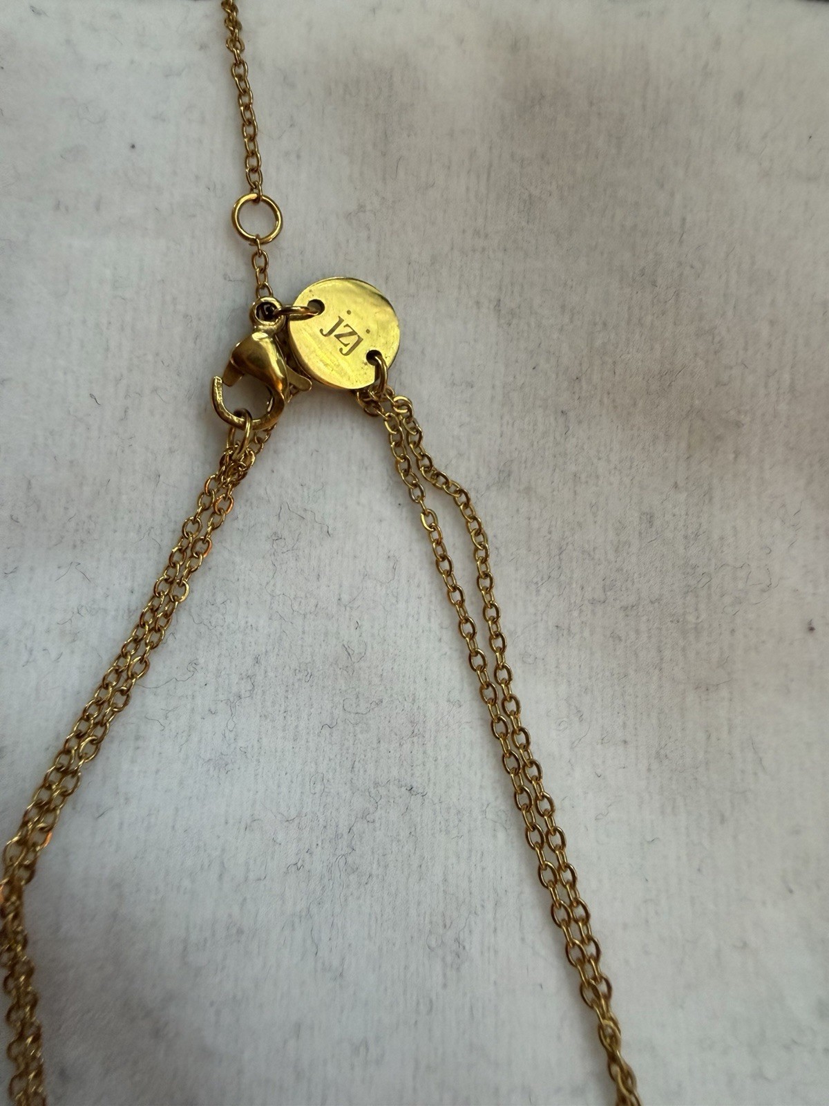 Jennifer Zeuner Jewelry Yellow Gold Plated Layered Star Necklace 19/20” chain