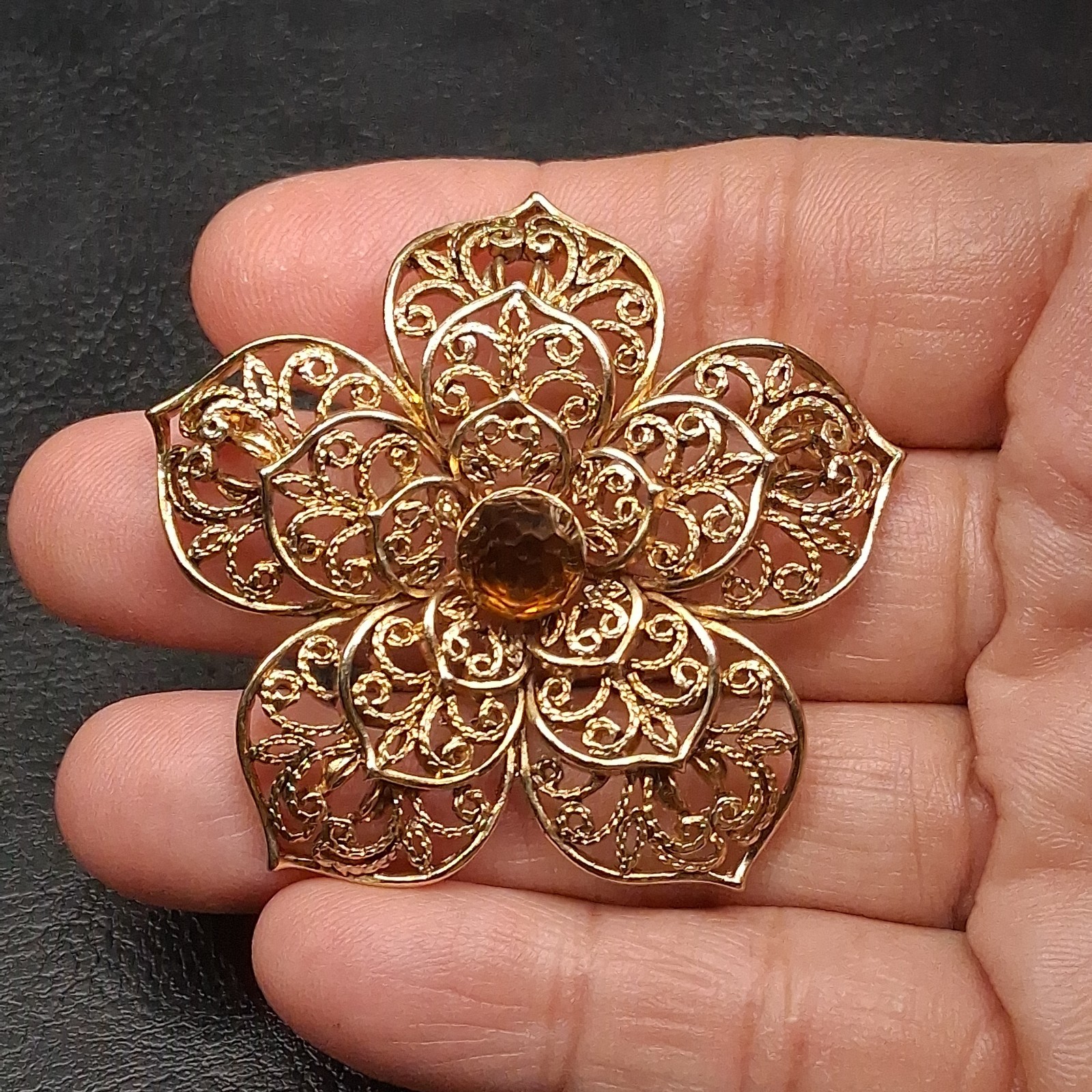 Signed MONET Gold Tone Filigree Flower Beooch Whit Brown Glass Center. 17.939
