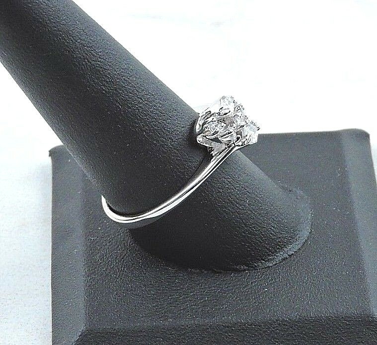 Sterling Silver .70 cttw Marquise And Round Cubic Zirconia Ring
