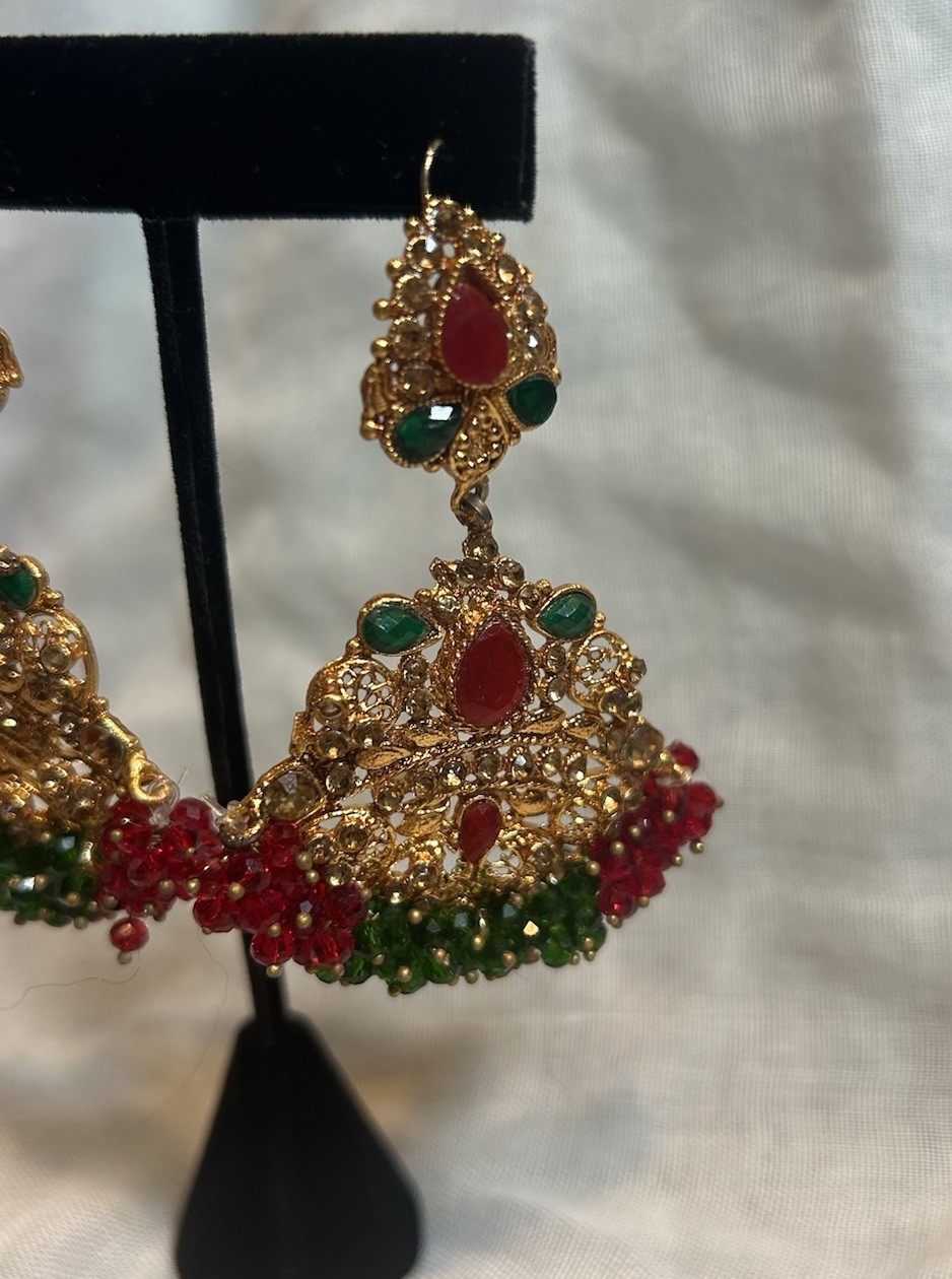 Gold Jewelry Set with Red and Green Details
