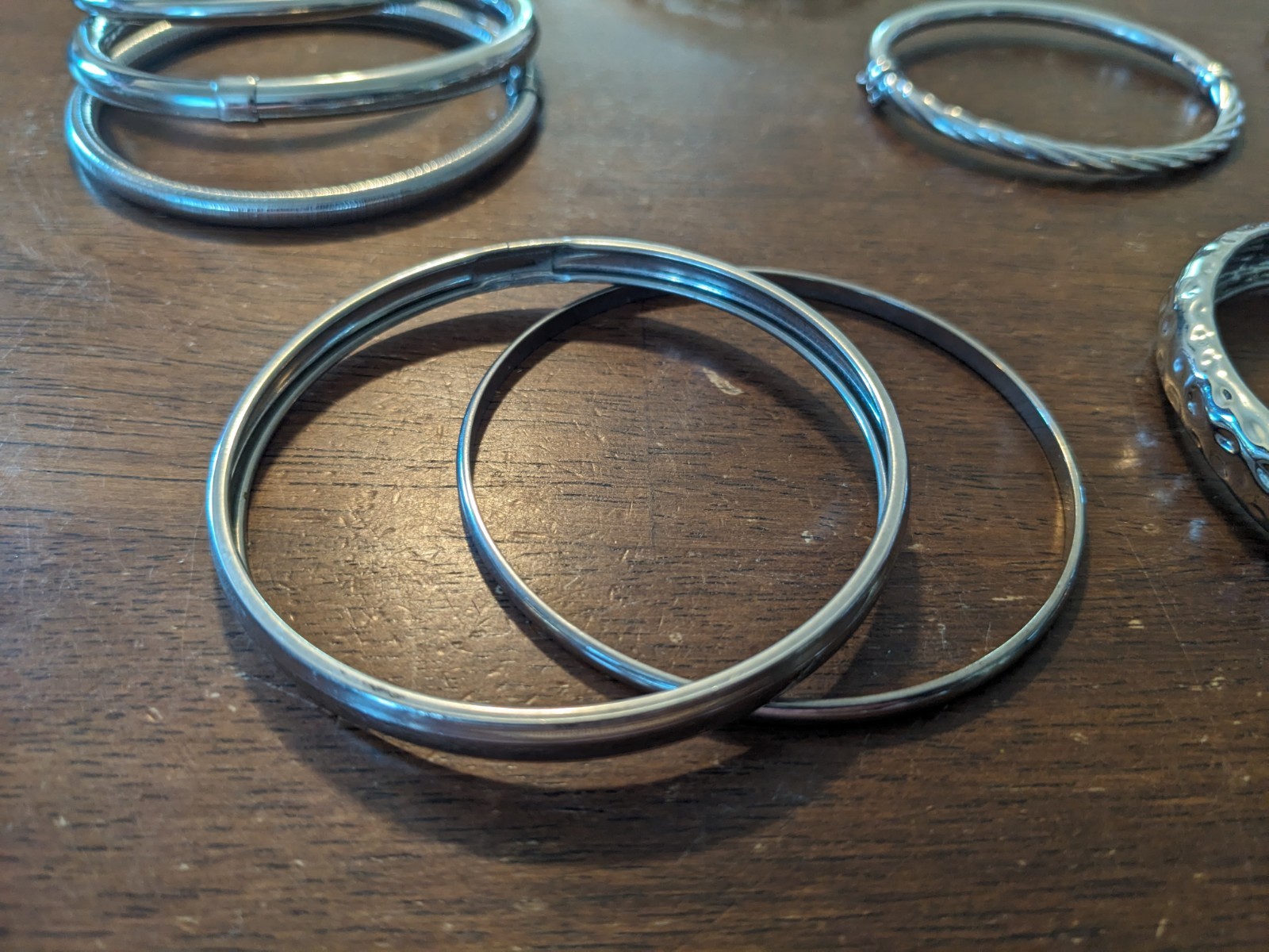 Lot of 24 Women’s Silver Tone, black metal & plastic Bracelets Variety