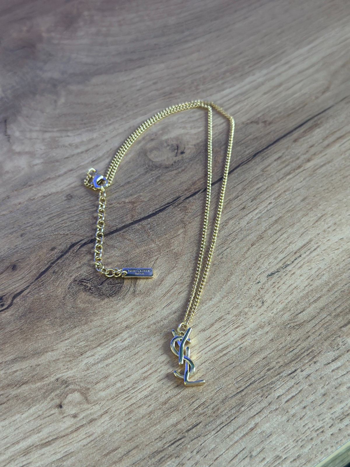 Saint Laurent YSL Monogram Pendant Gold Tone Necklace Adjustable Chain Luxury
