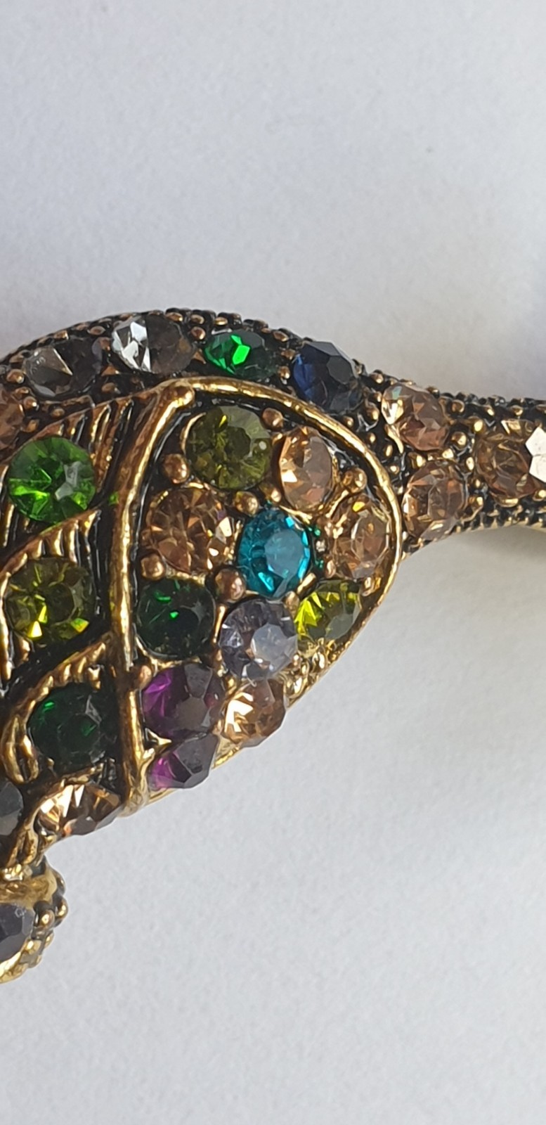 Peacock Brooch. Gold tone with Multicoloured glass beads . 84mm x 28mm.