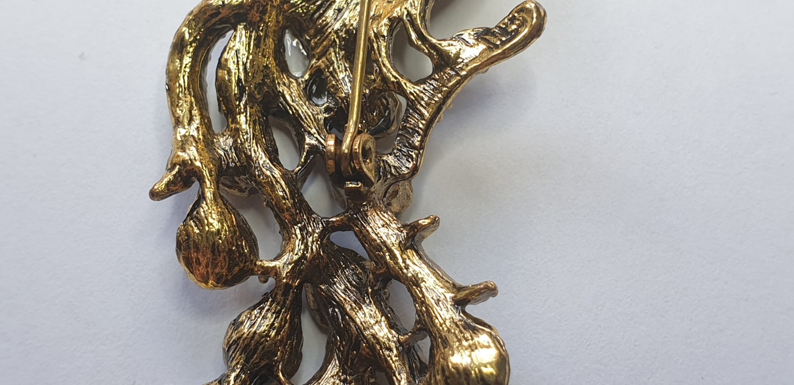 Peacock Brooch. Gold tone with Multicoloured glass beads . 84mm x 28mm.