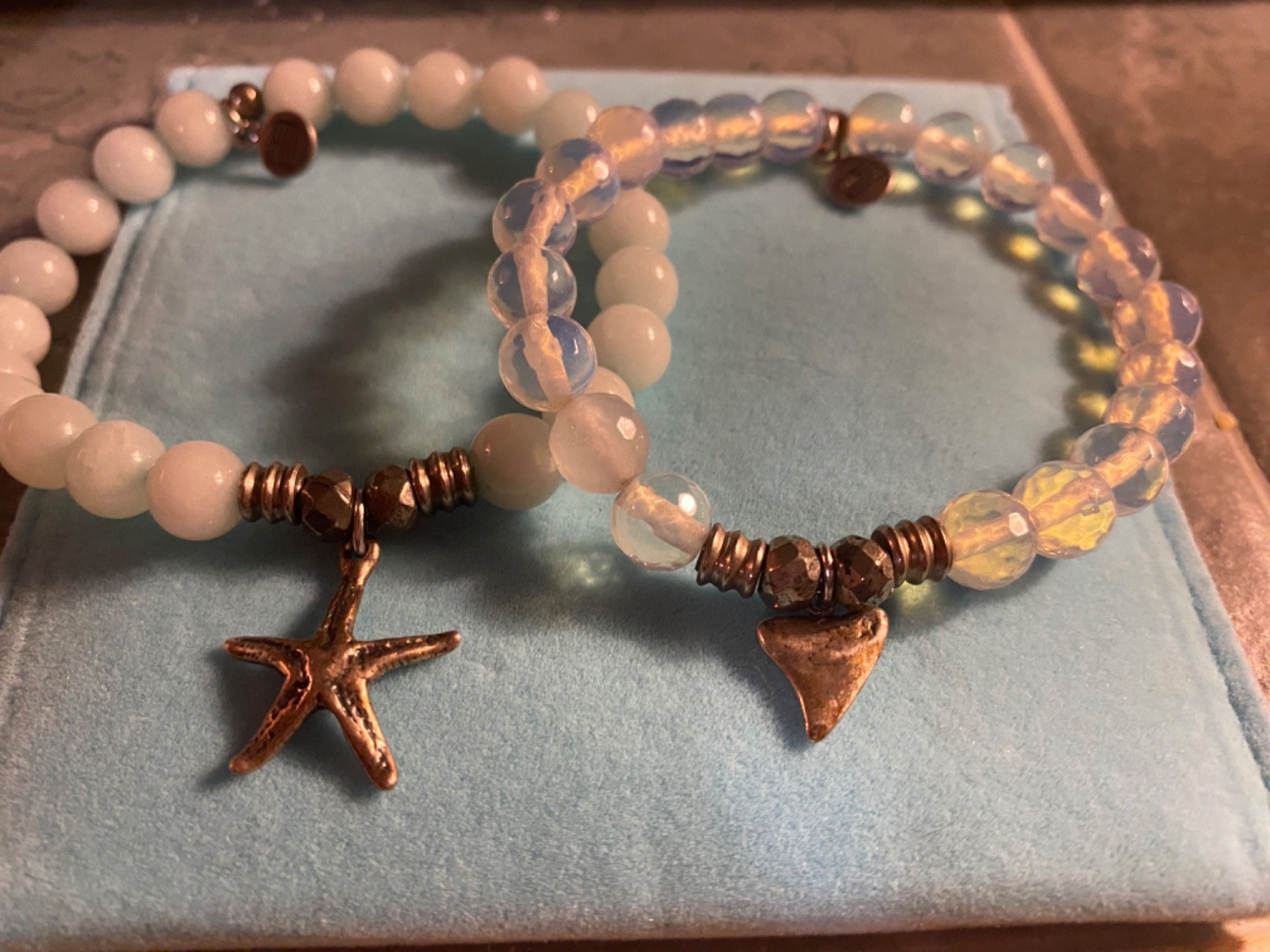 2 T Jazelle bracelets nautical , one starfish , one shark tooth regular size