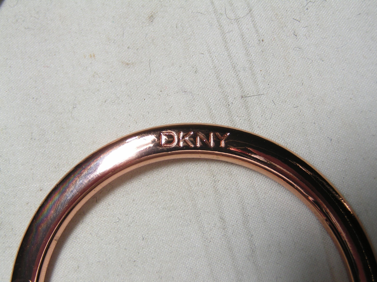…DKNY Donna Karan…Rose Gold Tone Wavy Design Bangle Bracelet…Small Size…