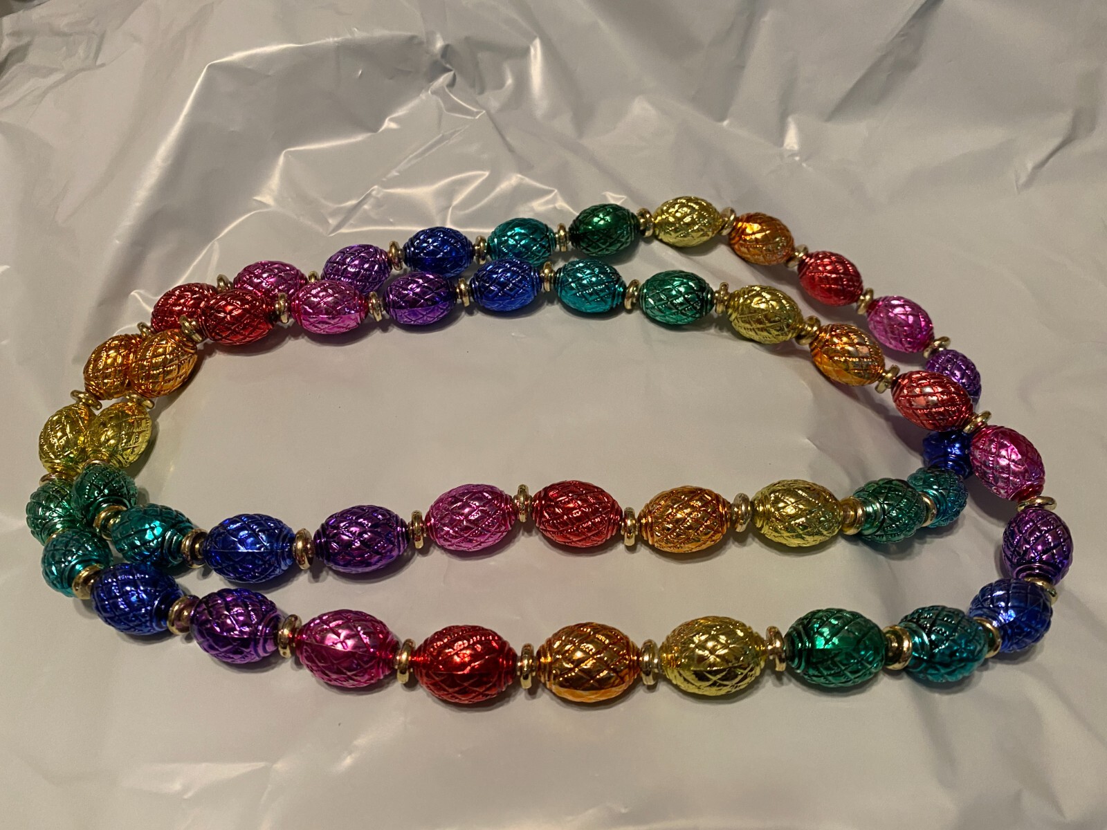 Beaded Necklace about 45 Inches long Pre owned in very good condition.
