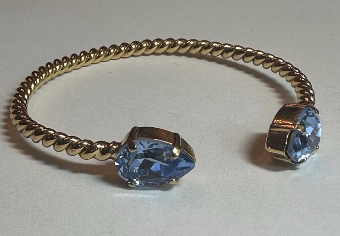 Caroline Svedbom Mini Drop Twisted Gold Tone Bracelet & Blue Swarovski Crystal