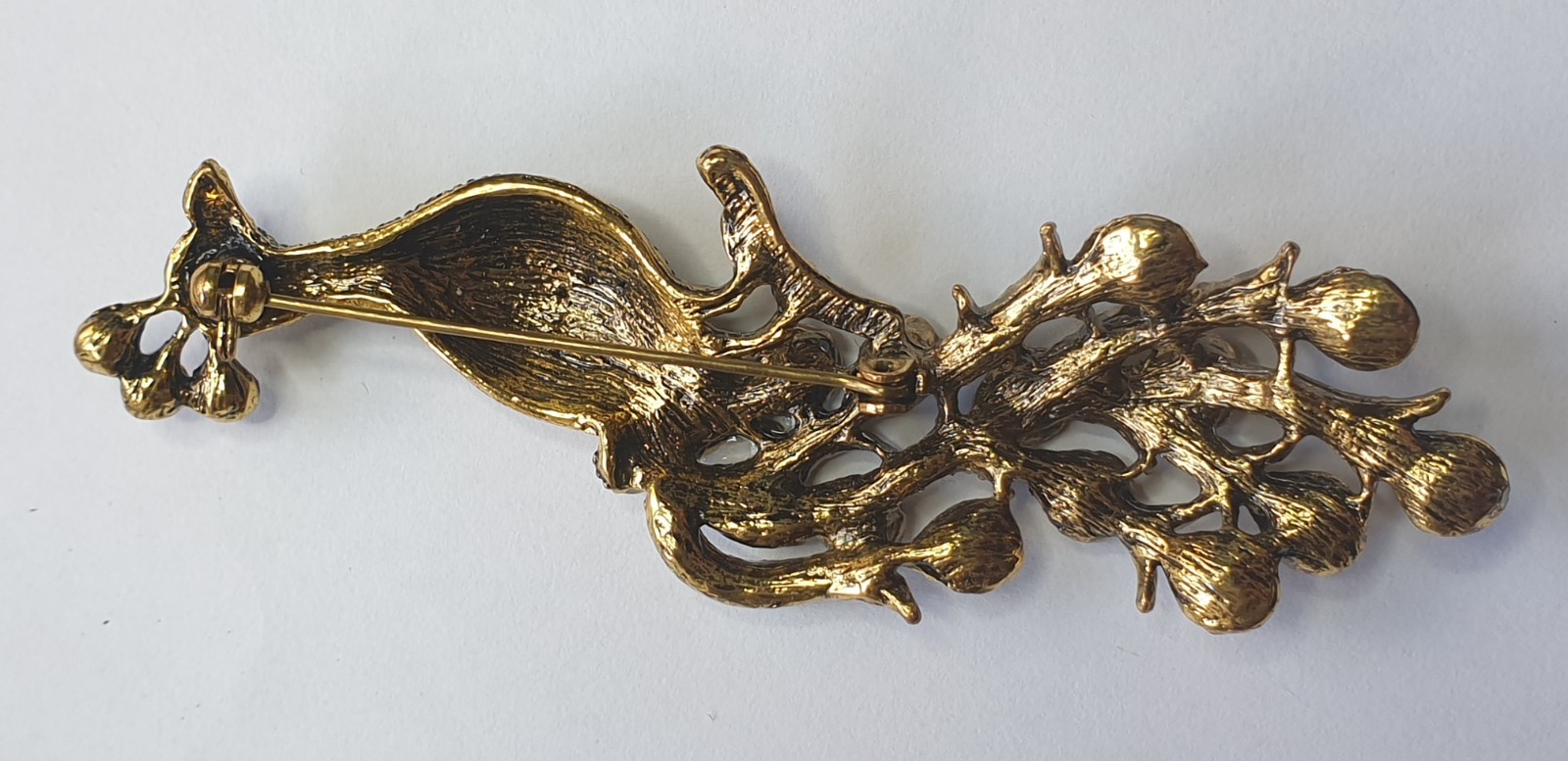 Peacock Brooch. Gold tone with Multicoloured glass beads . 84mm x 28mm.