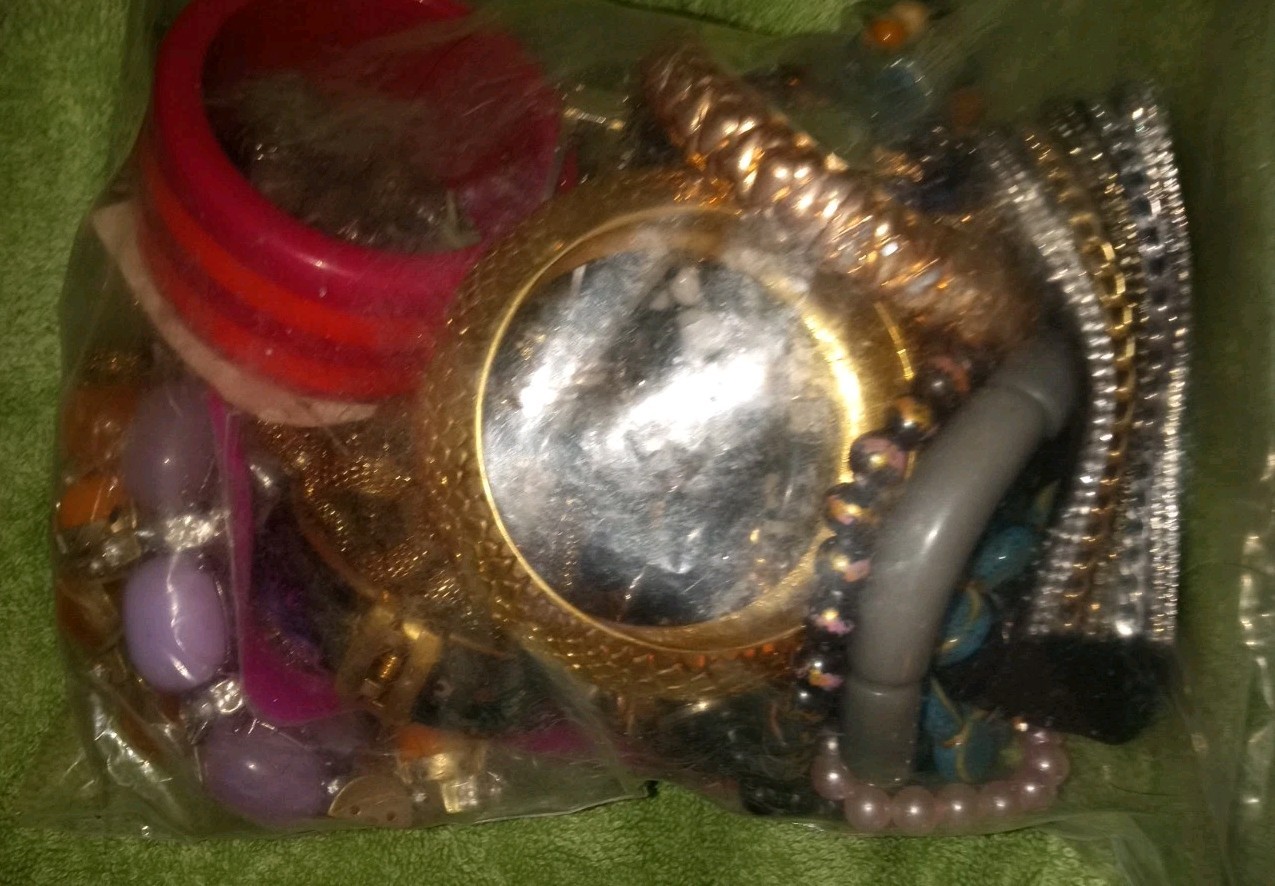 MULTIPLE FASHION BRACELETS MOST STRETCHY BUT SOME PRETTY ONES, SOME SIGNED BRASS