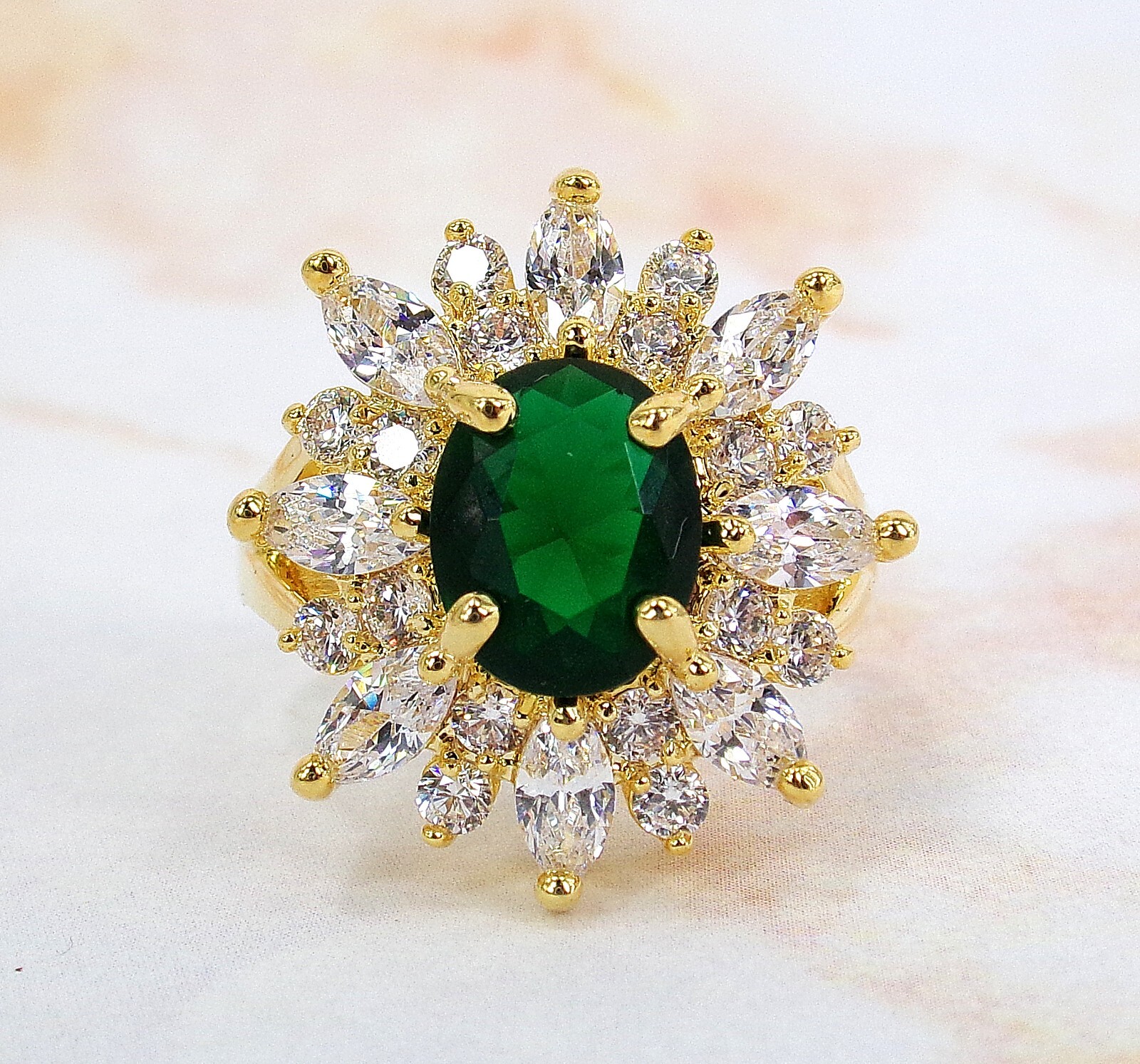 Large green oval cubic zirconia stone ring with clear marquise round CZ stones