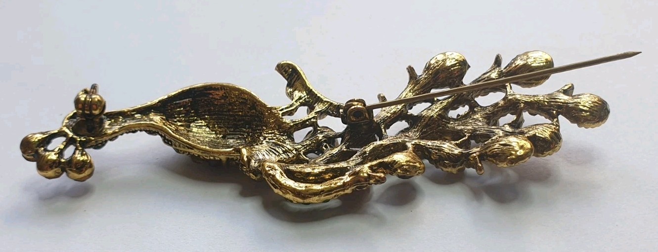 Peacock Brooch. Gold tone with Multicoloured glass beads . 84mm x 28mm.