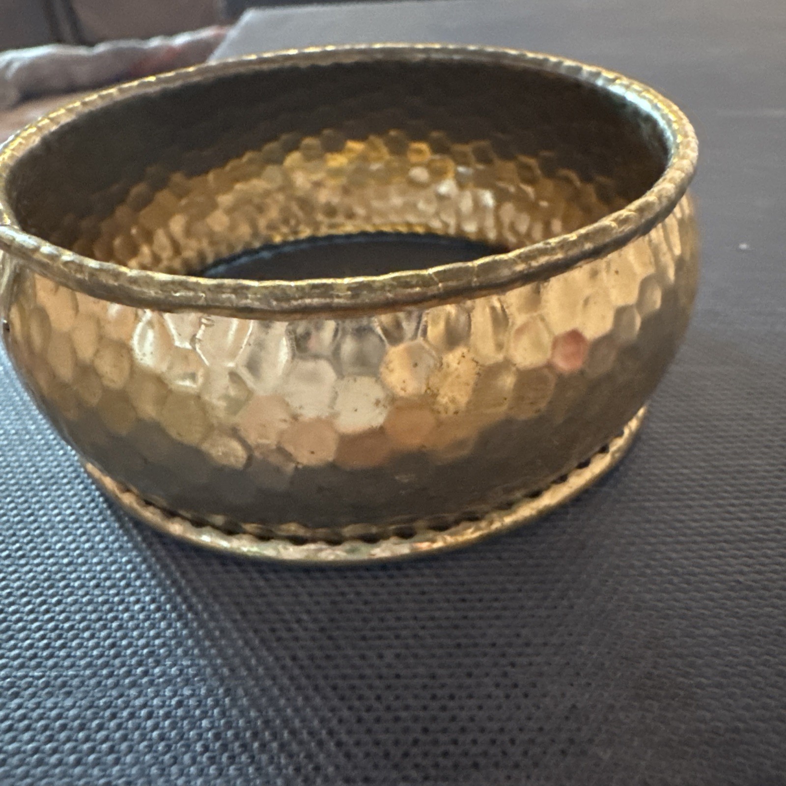 Hammered silver metal with a hint of gold tone overlay bracelet bangle no mark