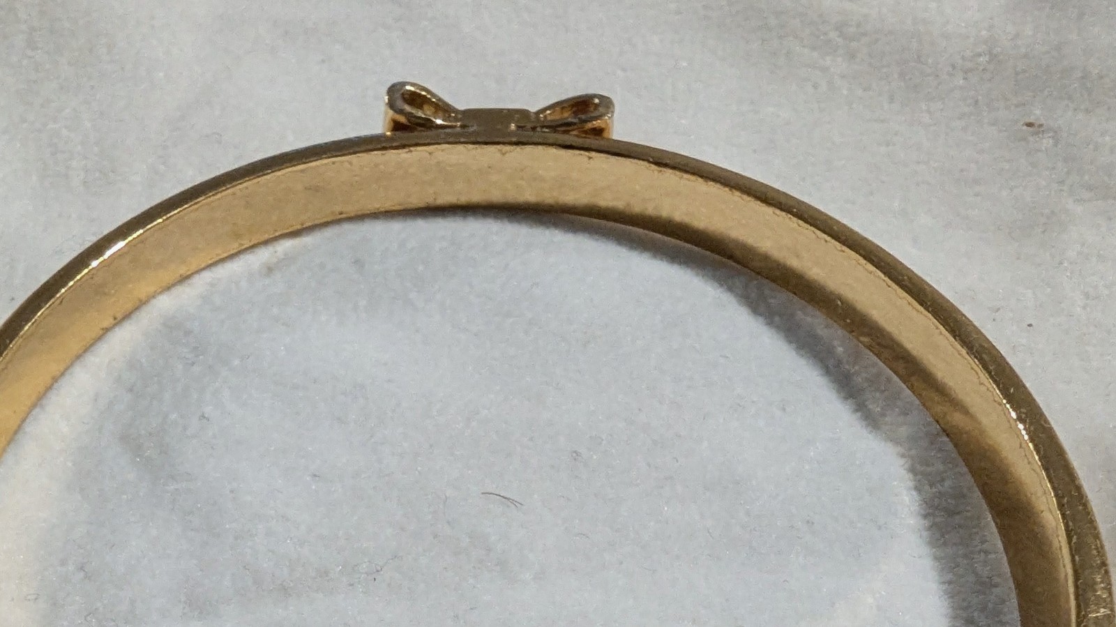 Kate Spade Small Bow Bangle Gold Tone 7.5” Slip-On Minimalist Stack Bracelet