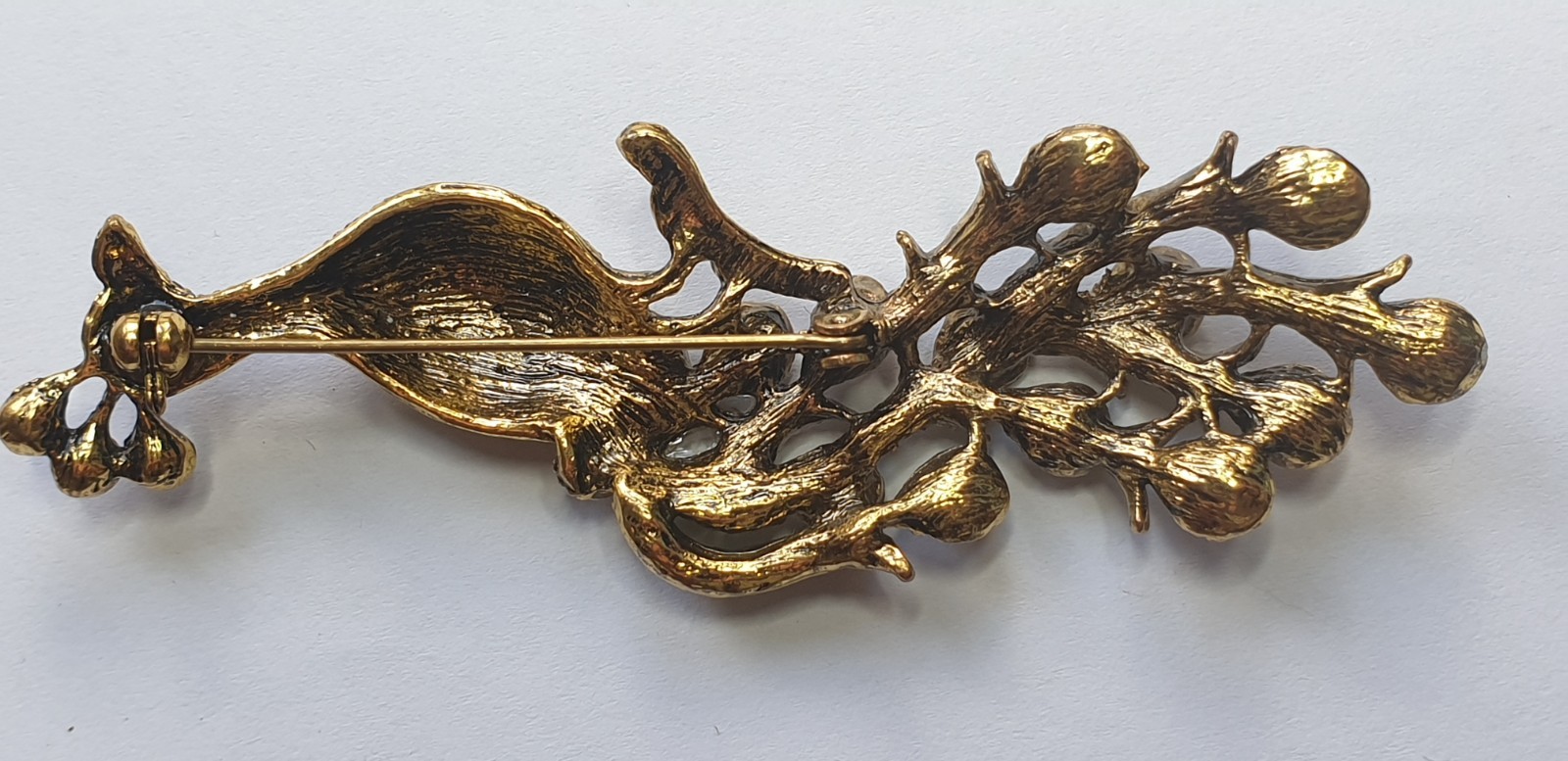 Peacock Brooch. Gold tone with Multicoloured glass beads . 84mm x 28mm.