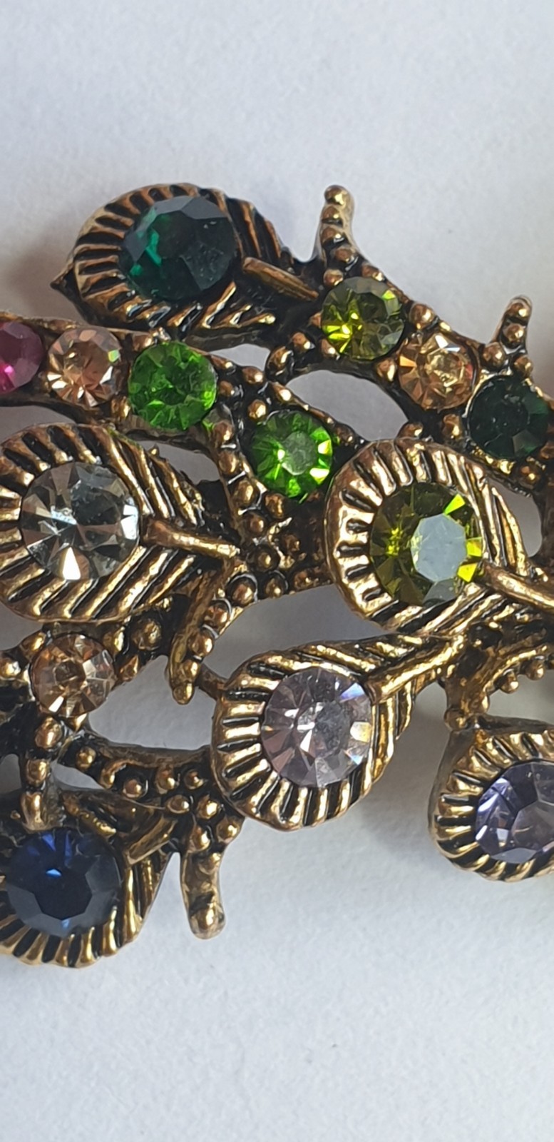 Peacock Brooch. Gold tone with Multicoloured glass beads . 84mm x 28mm.