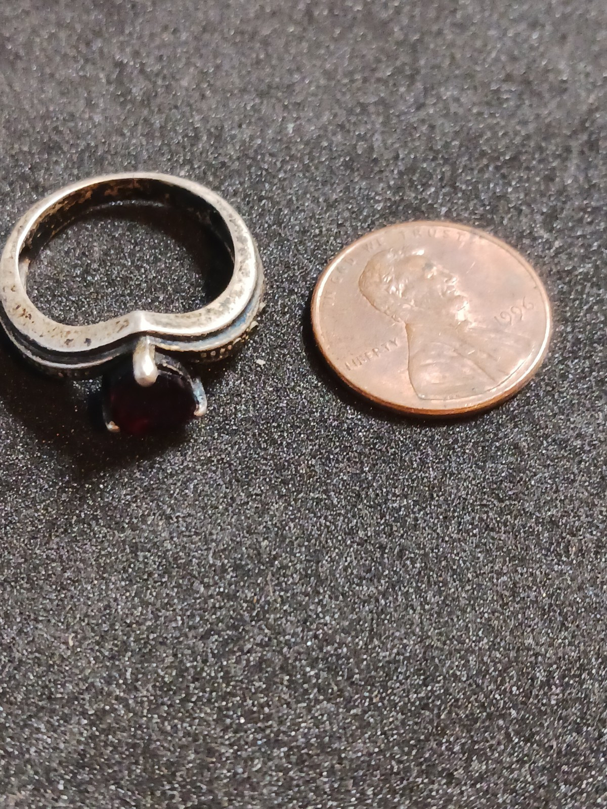 4 Beautiful Rings 3 with no markings 1 stamped M with a Trademark Nice