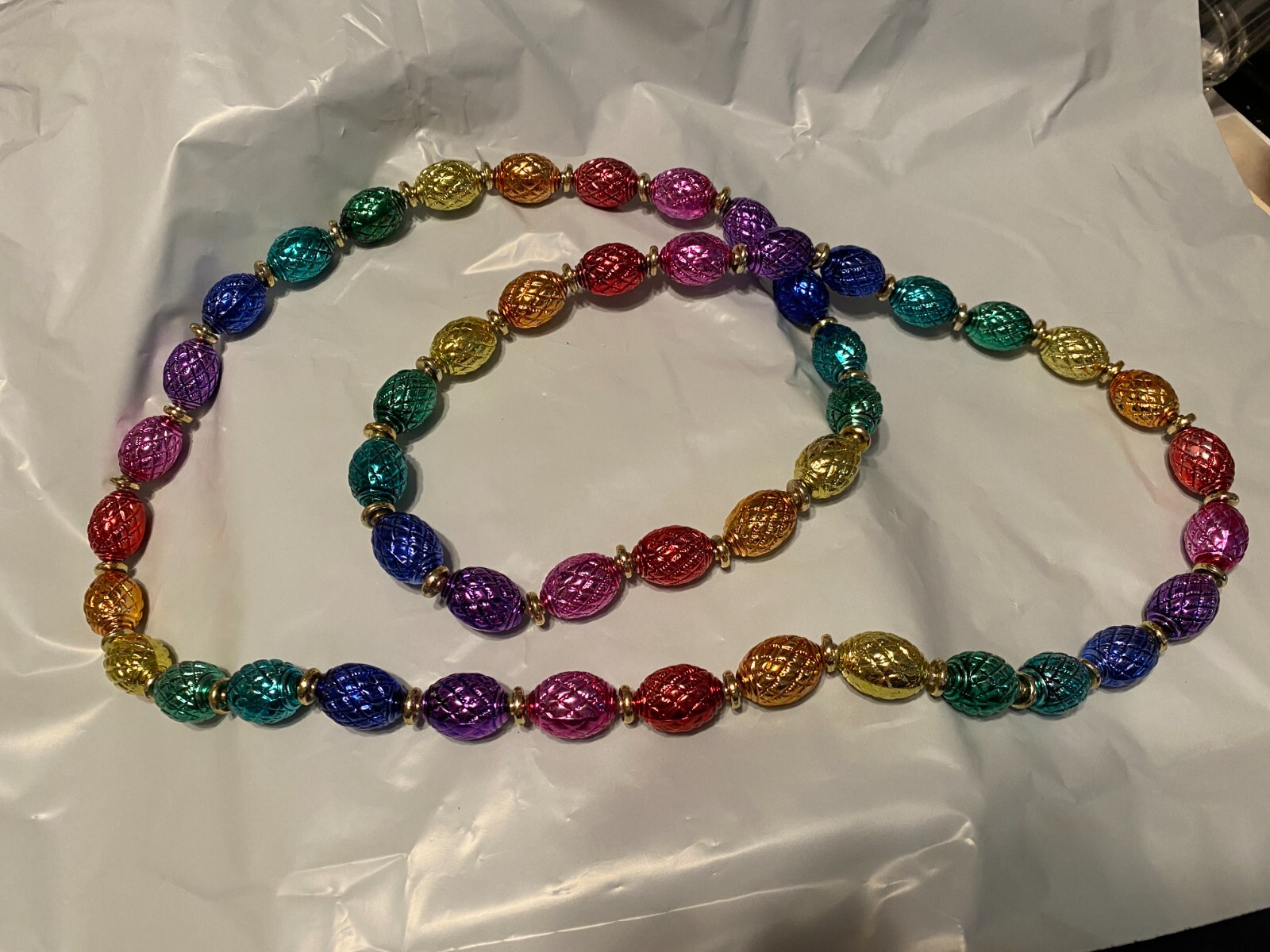 Beaded Necklace about 45 Inches long Pre owned in very good condition.