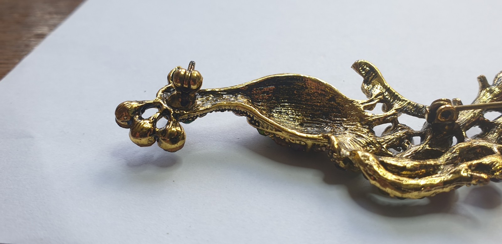 Peacock Brooch. Gold tone with Multicoloured glass beads . 84mm x 28mm.