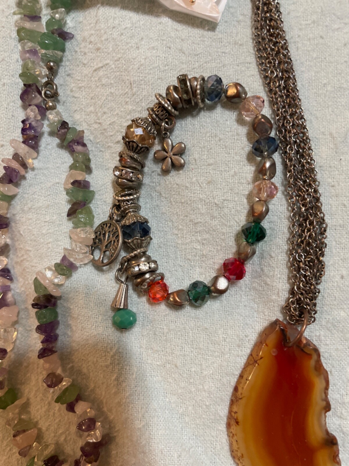 set amethyst necklace with enamel butterfly gold tone broch and 2 necklaces wit