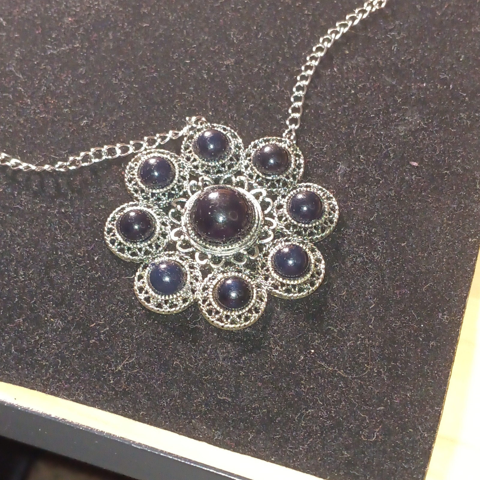 Black & Silver-Tone Pendant On A 24″ Stainless Steel Chain With No Clasp