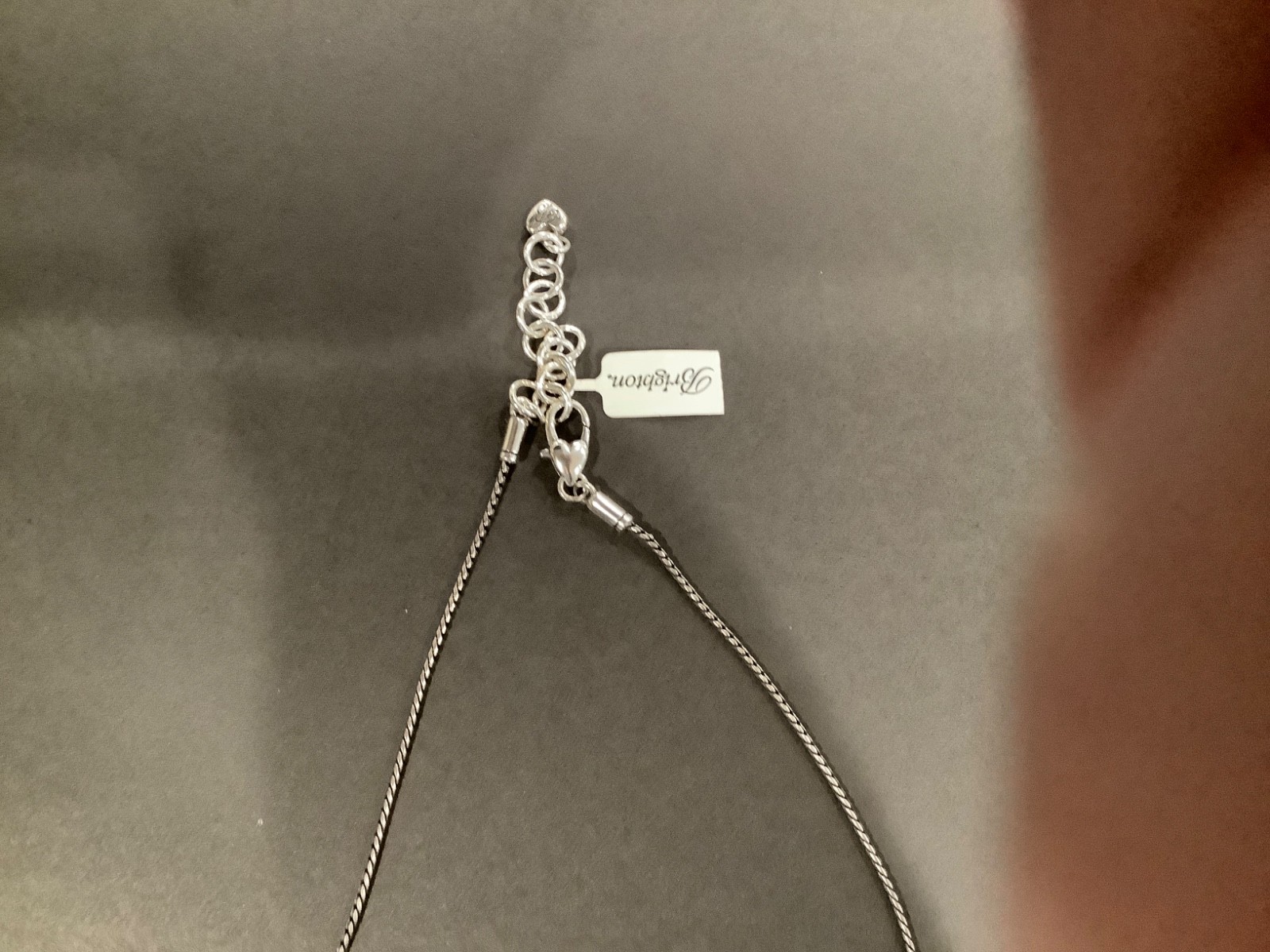 brighton necklace. Never used. With tags. About 36 inches in length. Adjustable