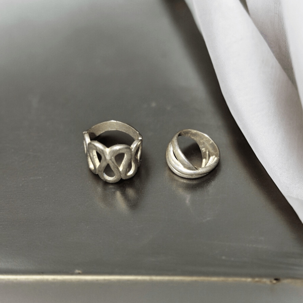 2 Set Of Rings Size 7 One Vintage Wave Ring & The Other Three Band Rolling Ring